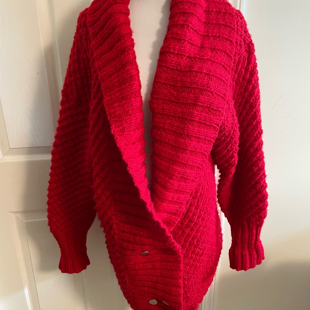 Bright red oversized wool cardigan sweater